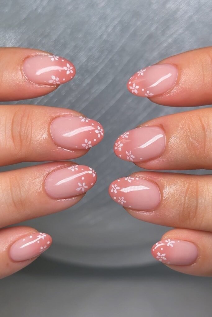 11. Tiny White Daisy Tips on Pink Nails