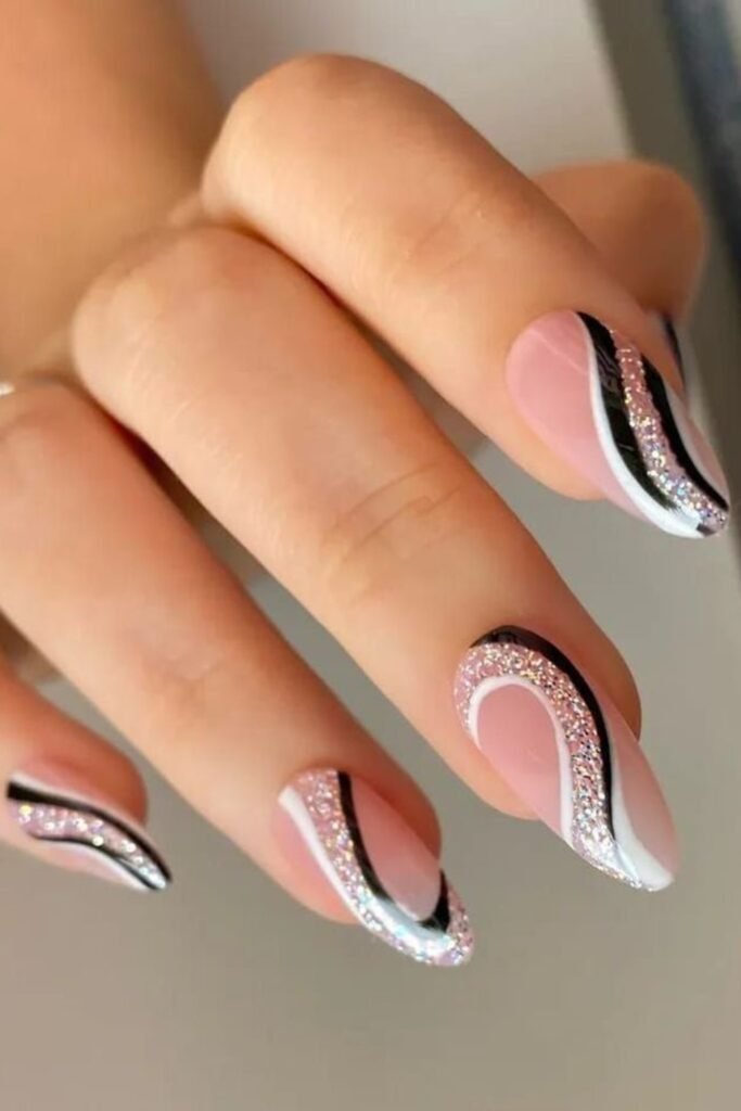 20. Black, White and Glitter Swirl Nails