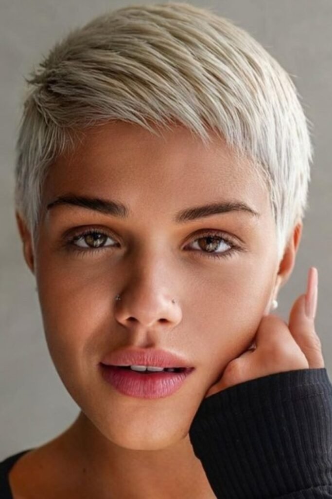 13. Ash Blonde Crop With Side-Swept Fringe