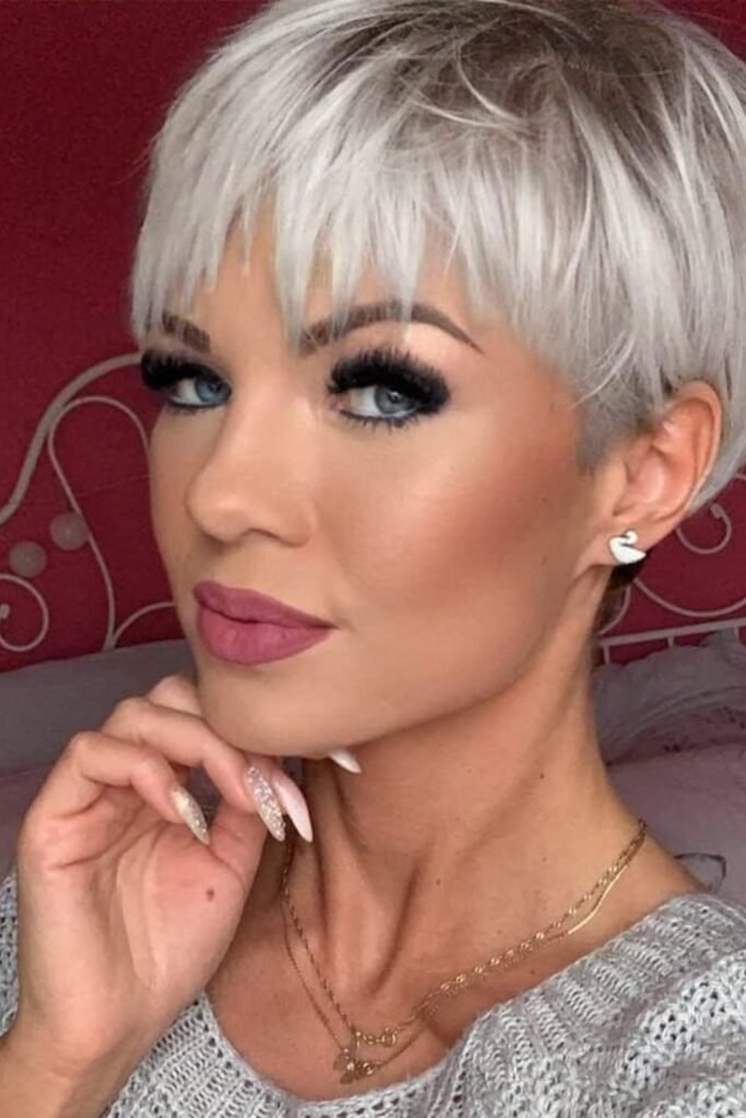 20. Silver Pixie With Textured Fringe and Dark Roots
