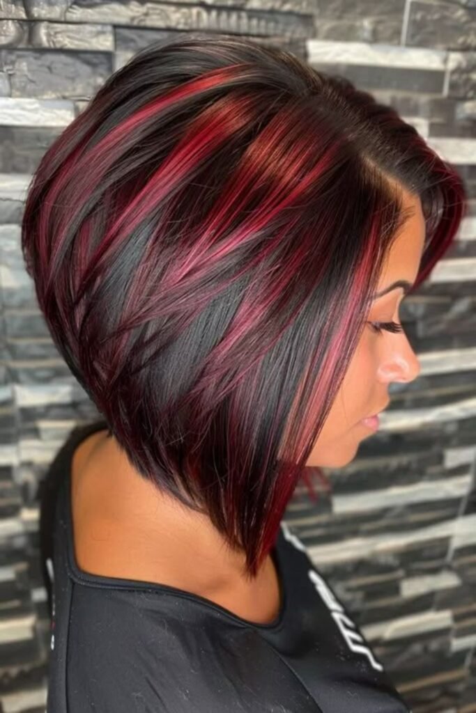1. Stacked Black Bob with Chunky Red Highlights
