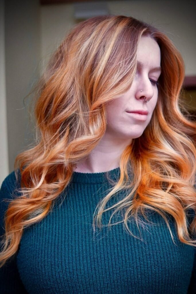 6. Peach Blonde Copper Waves with a Soft Root
