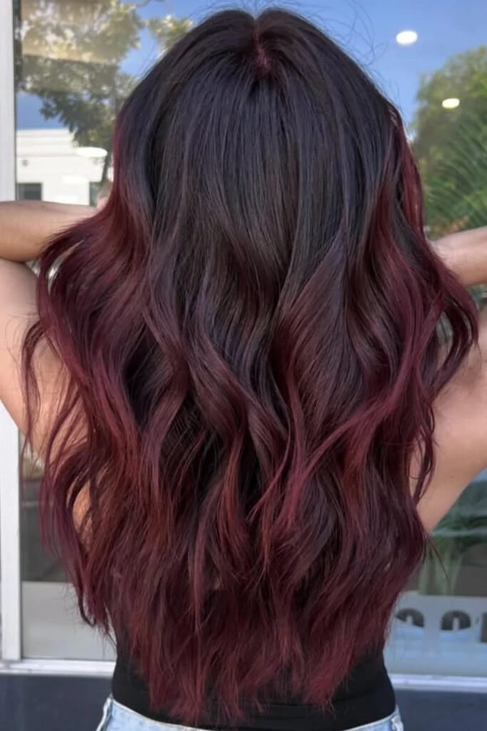 1. Deep Burgundy Ombre on Dark Brown Waves