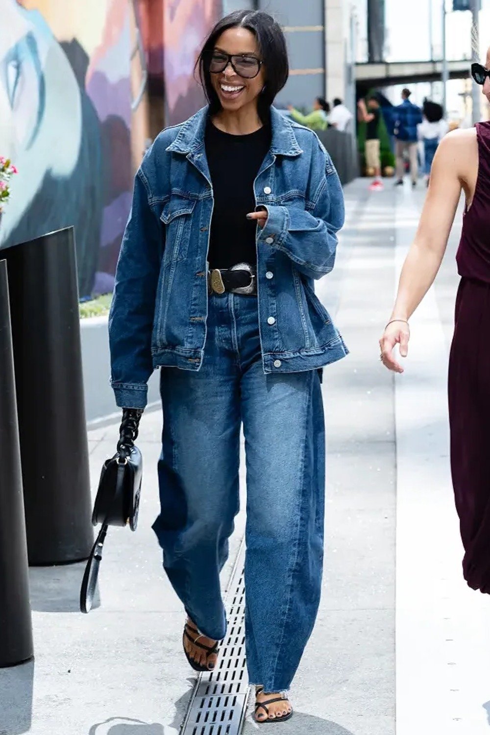 20. Oversized Denim Jacket with Barrel-Leg Jeans and a Western Belt