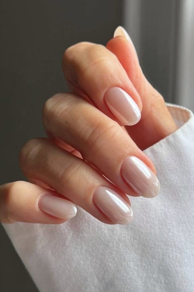 3. Pearly Milky Chrome Nude Nails