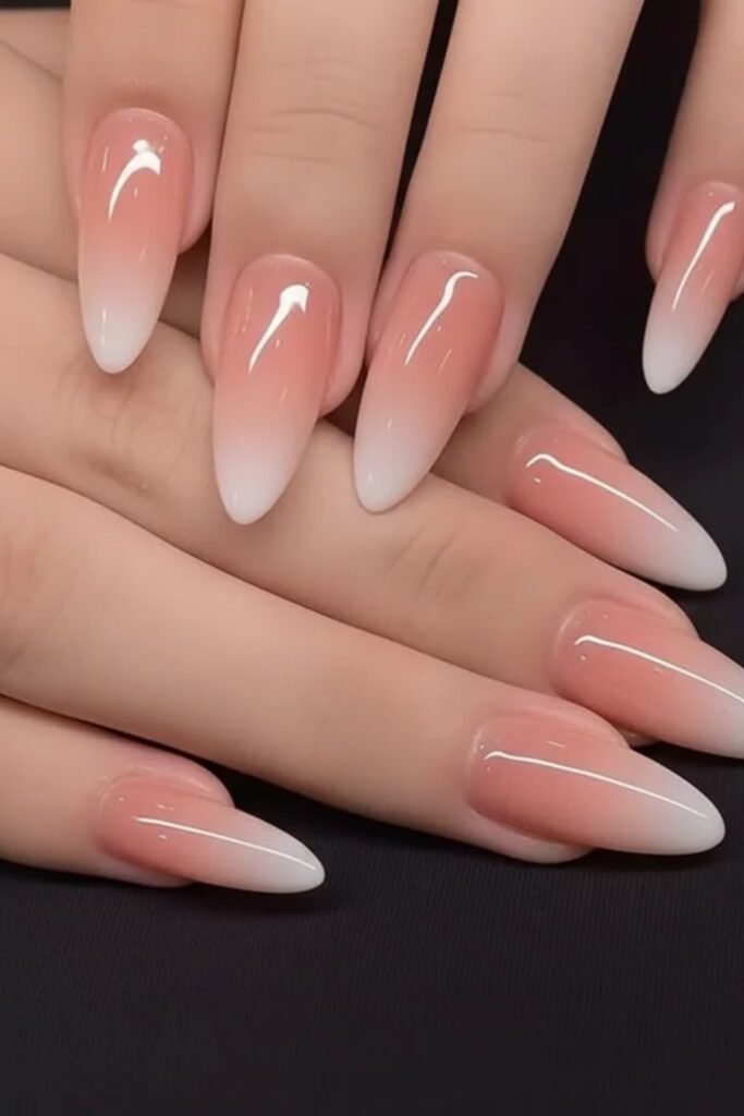 7. Pink to White Ombre Stiletto Nails