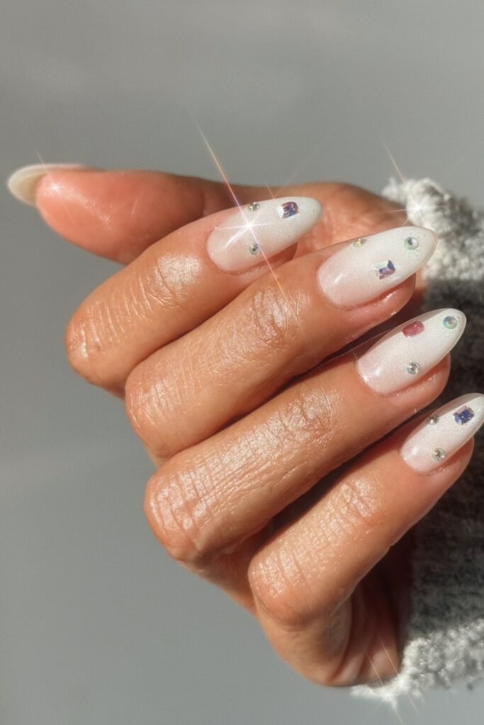 9. Milky White Gem Nails