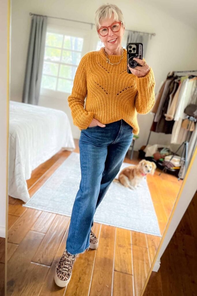 13. Mustard Pointelle Sweater with Dark Flare Jeans and Leopard Sneakers