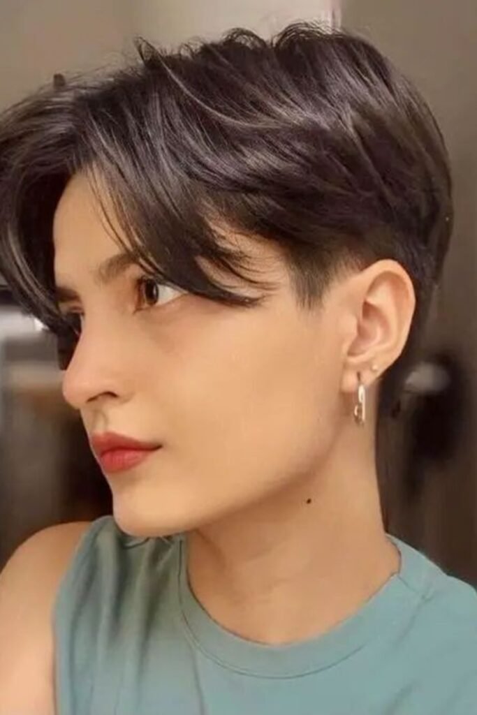 1. Long Top Pixie with Sweeping Side Fringe