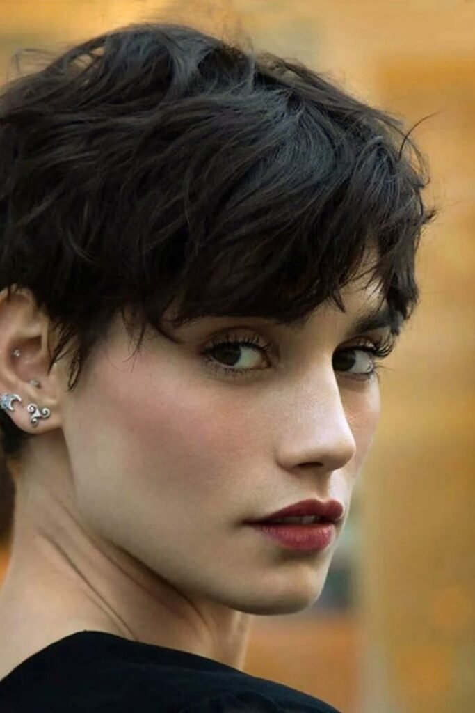 11. Soft Wavy Pixie with Wispy Bangs