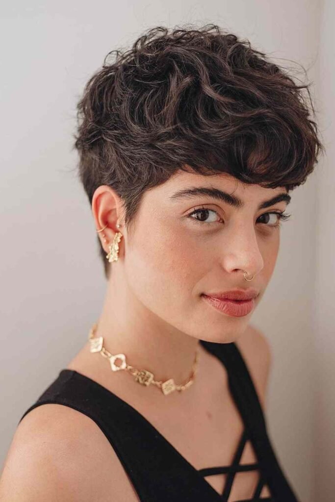 13. Wavy Curly Pixie with a Playful Curly Fringe