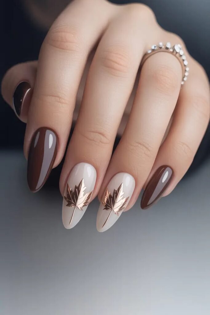 16. Chocolate Nails with Rose Gold Maple Leaves