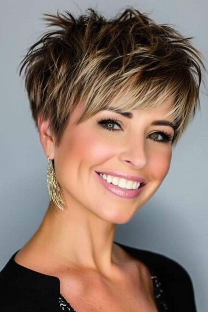 12. Spiky Espresso Pixie with Blonde Highlights